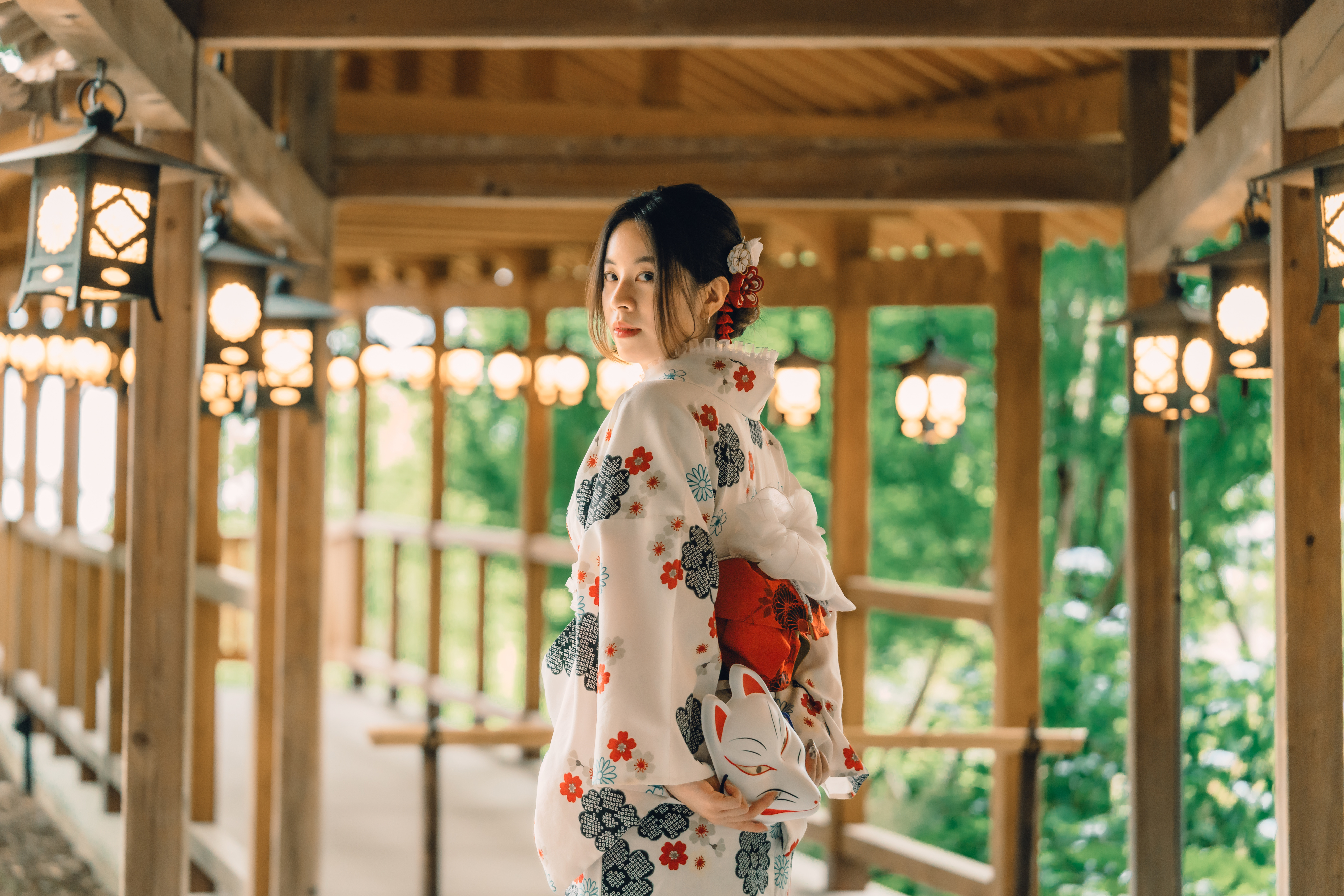 Wearing kimono at Japanese temple corridor